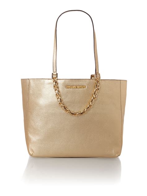 michael kors gold tote bag.